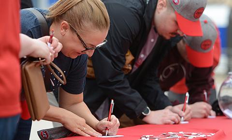 fans update their info at an SCSU event